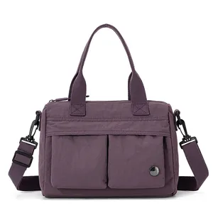 Large dark purple nylon tote bag with multi-pockets and adjustable shoulder strap