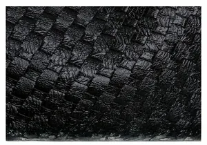 Close-up of premium black woven faux leather texture showing detailed intrecciato craftsmanship