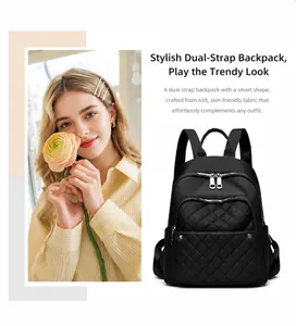 Detail view of black quilted nylon backpack with zip pocket and side compartments