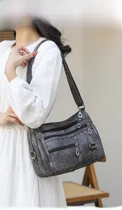 Retro multi-layer soft leather shoulder bag for women with detailed zipper compartments