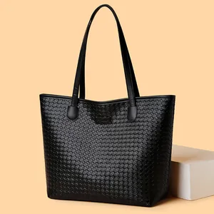 Classic black woven tote bag made of premium faux leather for office and daily commuting