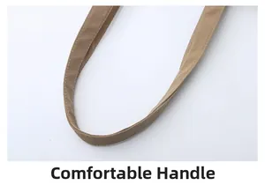 Close-up of a durable canvas tote handle with reinforced white contrast stitching
