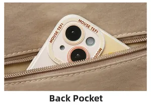 Detail view of khaki shoulder bag featuring back zipper pocket for smartphone storage
