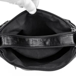 Μαύρη τσάντα χιαστί από δέρμα με τρεις θήκες με φερμουάρ και μεγάλη χωρητικότητα εσωτερικά