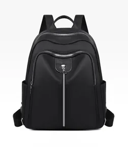 Front view of black Oxford cloth backpack with silver metal zippers and multi-layer pockets