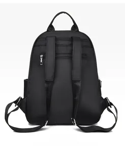 Detailed back view of a black oxford fabric backpack with adjustable straps and anti-theft pocket