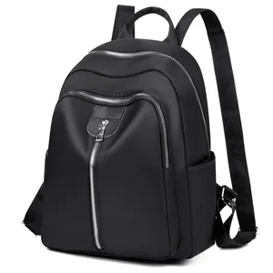 Minimalist black oxford cloth backpack for women with large capacity and silver zippers