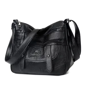 Elegante schwarze Damen-Umhängetasche aus Kunstleder mit vielen Reißverschlussfächern und Logo