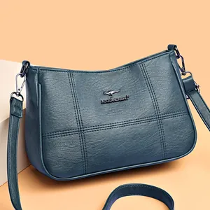 Navy blue faux leather crossbody bag for women with elegant quilted stitching design