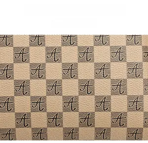 Close-up of checkerboard pattern fabric with letter prints and scratch-resistant texture