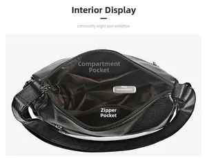 Detailed interior view of a black faux leather bag showing multi-pocket compartments