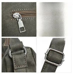 Detailed close-up of high-polish silver metal zippers and D-rings on durable gray fabric bag