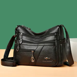 Black multi-pocket soft leather shoulder bag for women with silver ring zipper details