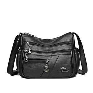 Women black soft faux leather shoulder bag with multi-zipper pockets and kangaroo logo