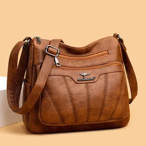 Bolso bandolera bordado en marrón para mujer en piel sintética con múltiples cremalleras
