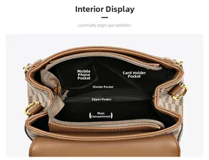 Internal view showing compartments and pockets of brown checkerboard handbag