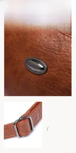 Detail of adjustable leather strap with gunmetal buckle and pebble grain texture