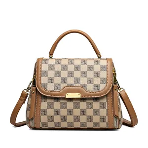 Classic checkered tote bag with monogram print and golden metal buckle on white background