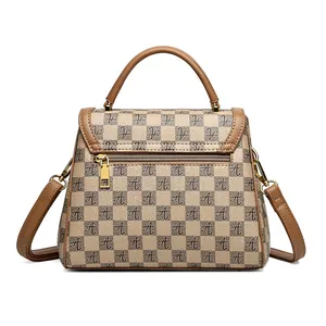 Classic checkered patterns on a stylish beige and brown crossbody bag with handle