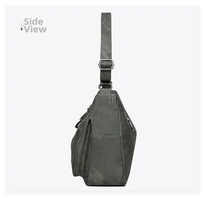 Side view of multi-layer canvas crossbody bag with adjustable strap and side pocket