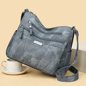 Versatile navy blue multi-layer shoulder bag with durable canvas and adjustable strap