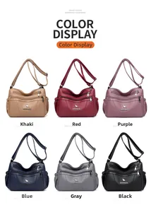 Detail showing various colors of soft leather shoulder bags with multi-zipper pockets