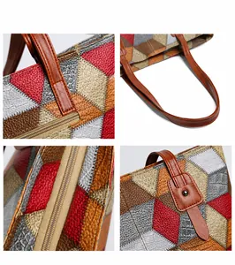 Detalle del bolso tote de cuero patchwork con costuras finas y cremallera metálica