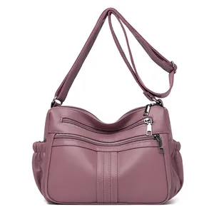 Borsa a tracolla in pelle PU viola scuro con multitasche e tracolla regolabile