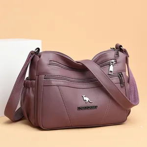 Minimalist soft leather crossbody bag for women in deep purple with multi-zipper pockets
