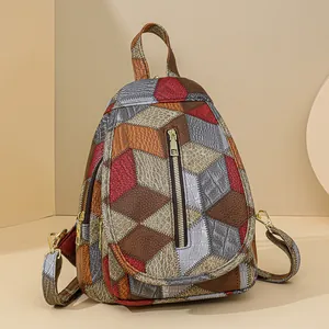 Fashion patchwork leather backpack for women with multi-texture panels and front zipper