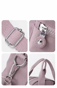 Detalle del bolso de nailon lavanda con hebillas metálicas plateadas y tiradores de cremallera