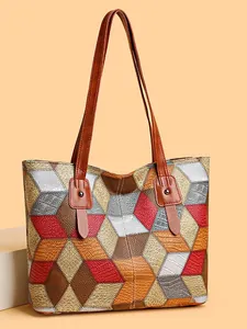 Elegante bolso tote de cuero patchwork con patrones geométricos y gran capacidad
