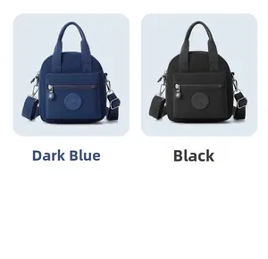 Minibolsos bandolera de nailon en azul oscuro y negro con correas desmontables