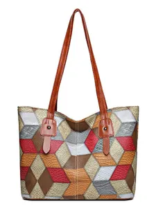 Bolso tote de cuero con diseño de retazos geométricos y elegantes asas largas