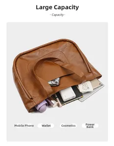 Top view of large brown tote bag interior showing capacity for tablet and daily items