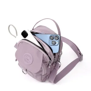 Sac bandoulière en nylon violet clair pour femme avec compartiments zippés et portable