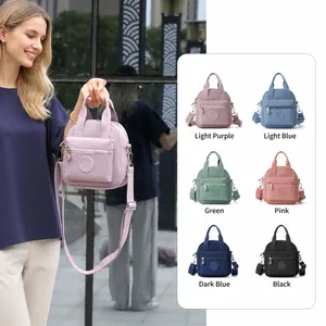 Mini bolso bandolera ligero de nailon en varios colores con correa ajustable y asas