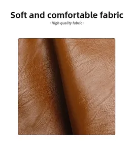 Detailed close-up of brown litchi pattern leather showing soft and flexible texture