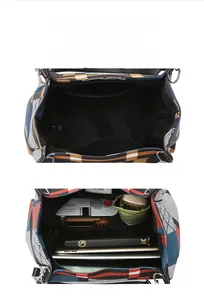 Spacious interior of the checkered tote bag showing camera and tablet storage with a zip pocket