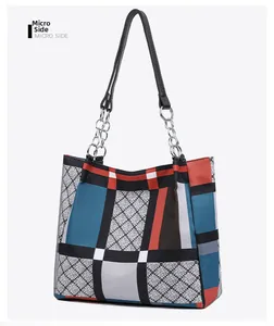 Micro side view of nylon plaid tote bag with silver chain links and black shoulder strap