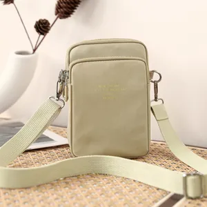 Minimalist khaki nylon crossbody mobile phone bag with double zippers and wide strap