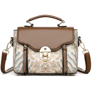 Elegant retro crossbody bag with jacquard wave patterns and gold metal lock detail