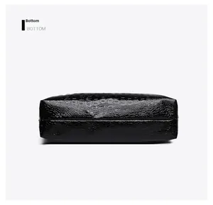 Detailed bottom view of large capacity black crocodile pattern faux leather tote bag
