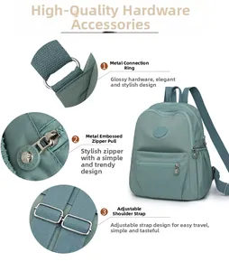 Detail view of water-resistant light green nylon backpack with premium silver hardware and zippers