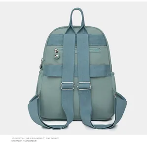 Detail view of the backpack back featuring adjustable straps and anti-theft zipper pocket