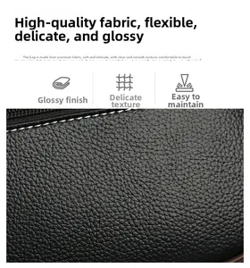 Detail of black lychee grain leather with oily luster and fine white stitching texture