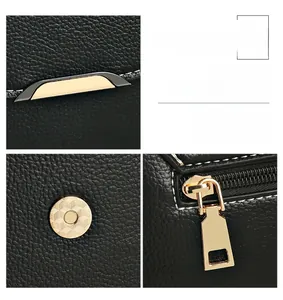 Detailed view of premium gold-toned hardware and pebbled leather texture on black handbag