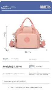 Detailed size specifications for pink nylon shoulder bag with adjustable strap