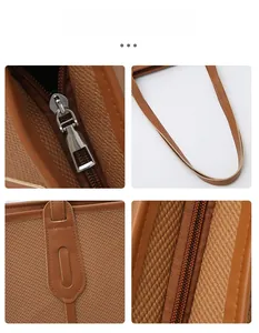 Detail of brown woven tote bag featuring reinforced leather straps and metal zipper