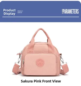 Front view of cherry pink nylon crossbody bag with multi-layer zipper pockets and top handle